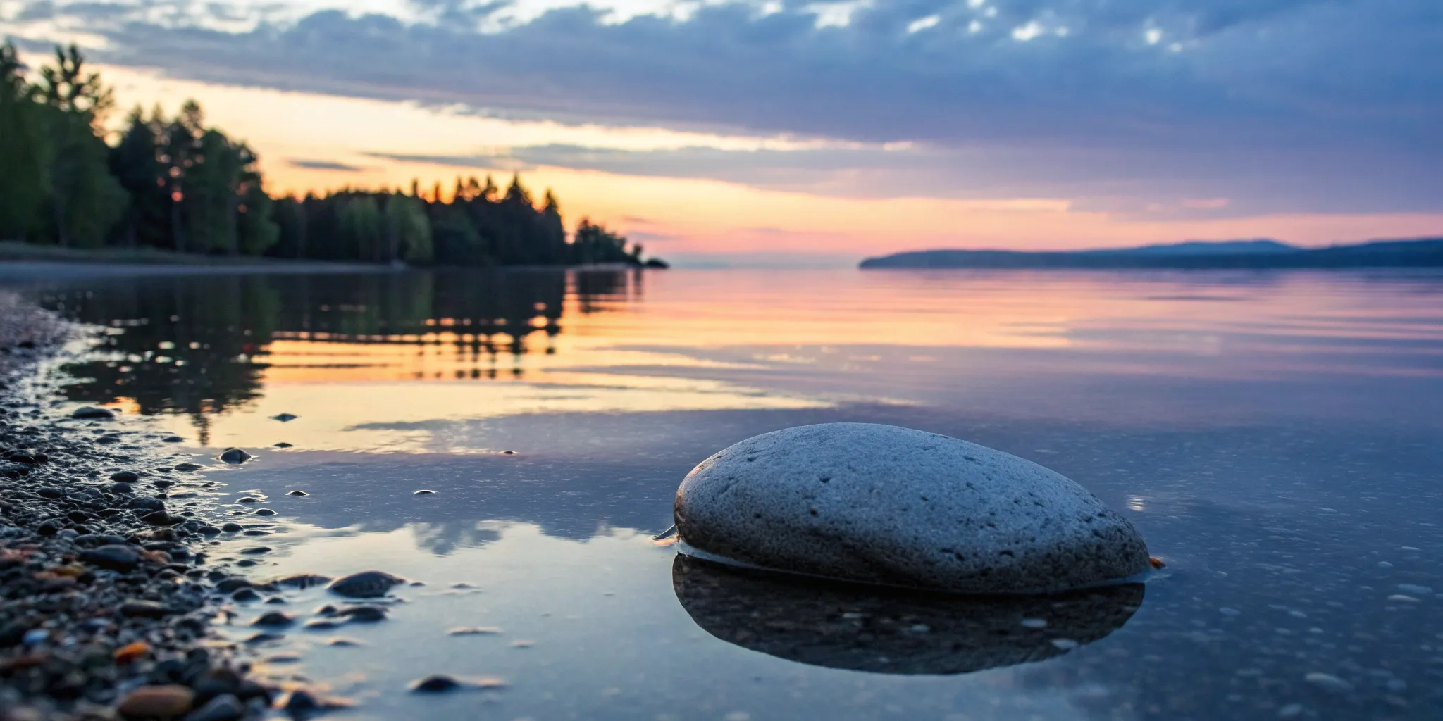 Smooth stones on a calm shore, finding relief with vitamins for numbness and tingling.