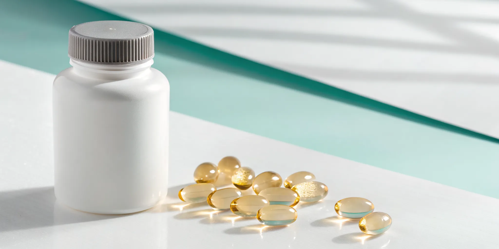 A white bottle and several yellow nerve relief capsules for nerve support.